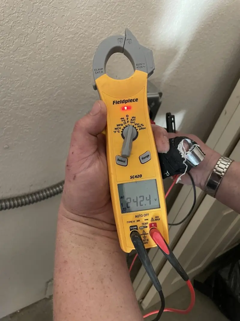 Voltage testing with clamp meter during Electrical Installation Services in Citrus Springs